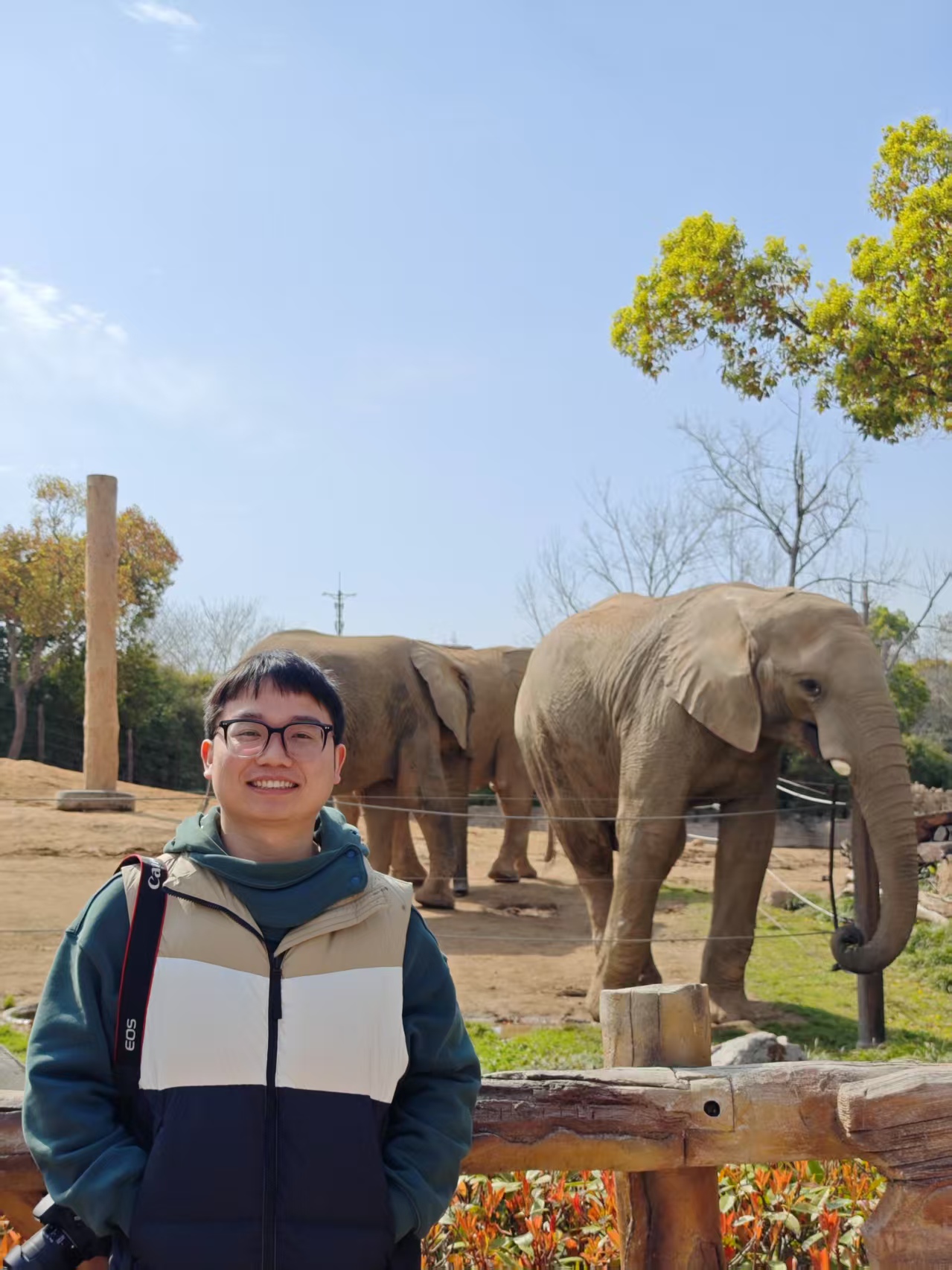 Portrait of Wang Xiaolong outdoors